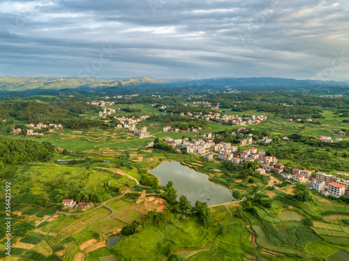 Rural countryside aerial view, green countryside and villages, Hunan, China。