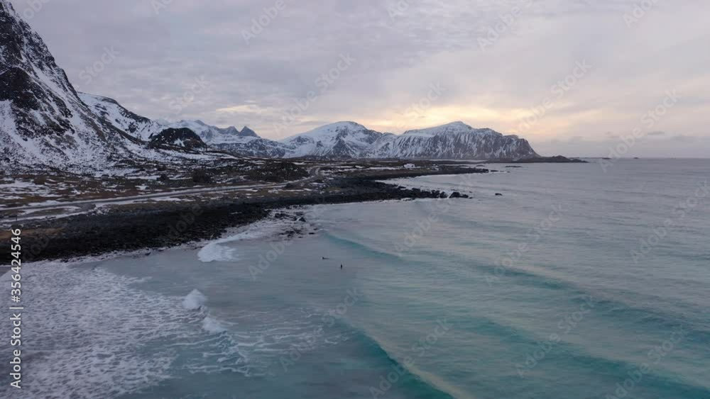 4k drone forward video (Ultra High Definition) of Skagsanden beach. Dramatic sunset on Vestvagoy island. View from flying drone of Lofoten Island. Nice evening seascape of Norwegian sea. 4k drone forward video (Ultra High Definition) of Skagsanden beach. Dramatic sunset on Vestvagoy island. View from flying drone of Lofoten Island. Nice evening seascape of Norwegian sea.