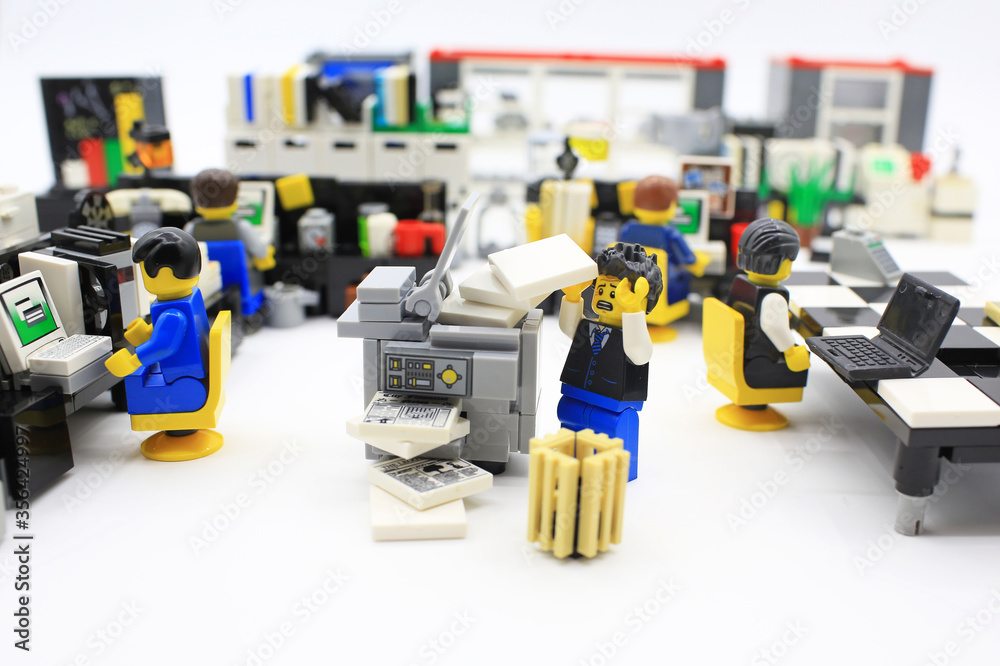 HONG KONG,MARCH 22: Studio shot of Lego people in office, combine from  different set. Legos are a popular line of plastic construction toys  manufactured by The Lego Group in Denmark Stock Photo