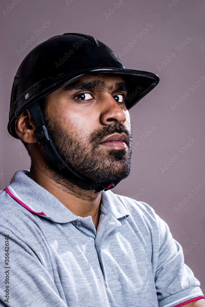 Weird looking Service Man with Helmet, Repairman with Helmet looking into camera Weird looking Service Man with Helmet, Repairman with Helmet looking into camera