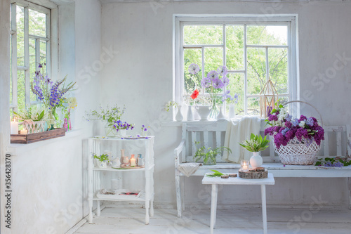 white vintage interior with flowers © Maya Kruchancova