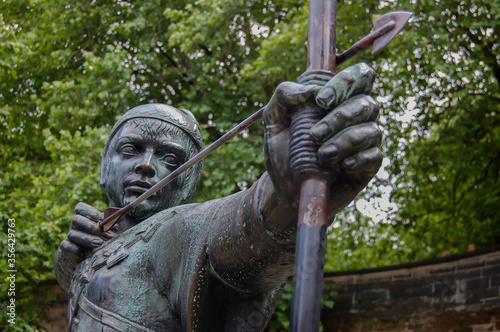 Detail of the statue of Robin Hood standing near Nottingham Castle in Nottingham, England.
 photo