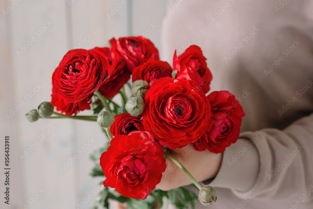 Gorgeous flowers peonies in the hands of a girl for weddings and other holidays Gorgeous flowers peonies in the hands of a girl for weddings and other holidays