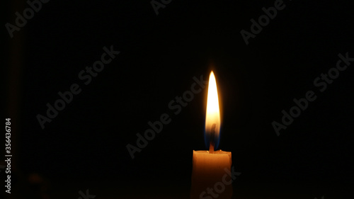Candle flame candle light on black or dark background