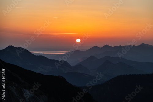Sonnenaufgang mit Blick vom Gipfel der Rotwand im Mangfallgebirge bei Schliersee photo