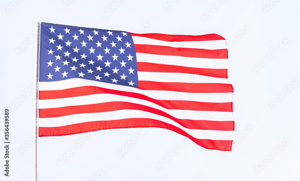 Fototapeta premium American flag and the blue sky