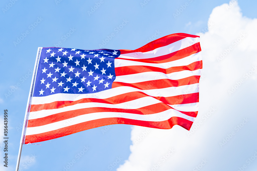 Obraz premium American flag and the blue sky