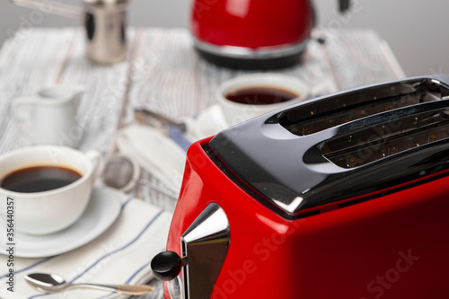 Close up of red kitchen .appliances on kitchen table