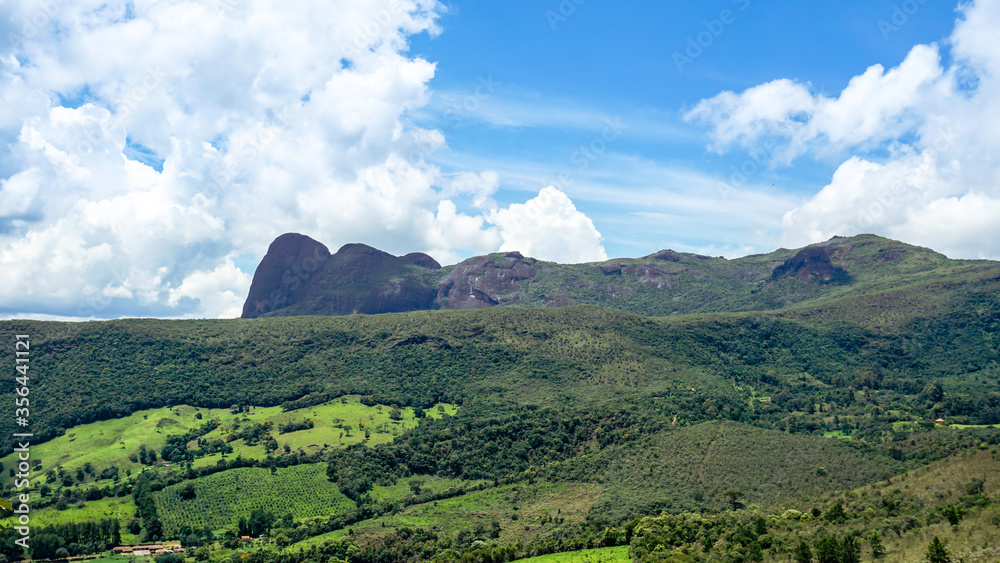 Beautiful and bucolic landscape in Aiuruoca, Minas Gerais, Brazil. On background, Parrot's Peak (Pico do Papagaio)