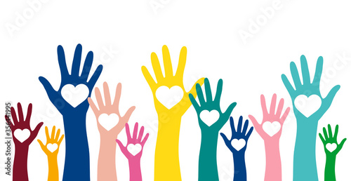 Volunteering, charity and donating concept. Raised colorful hands with white heart vector design element