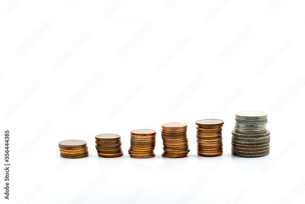 Coins stacked on a white background Growth concept Business finance And the availability of a money-saving Coins stacked on a white background Growth concept Business finance And the availability of a money-saving