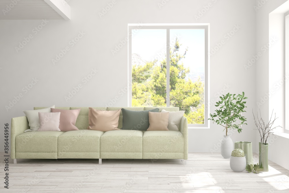 Fototapeta premium White living room with sofa and summer landscape in window. Scandinavian interior design. 3D illustration