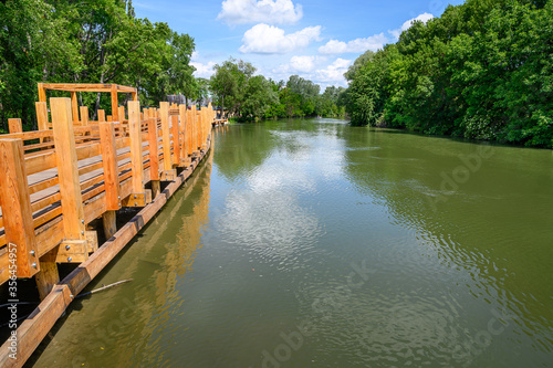 Korzo Zalesie - area for leisure activities with wooden bridge walk by Little Danube river in village of Zalesie (SLOVAKIA) photo