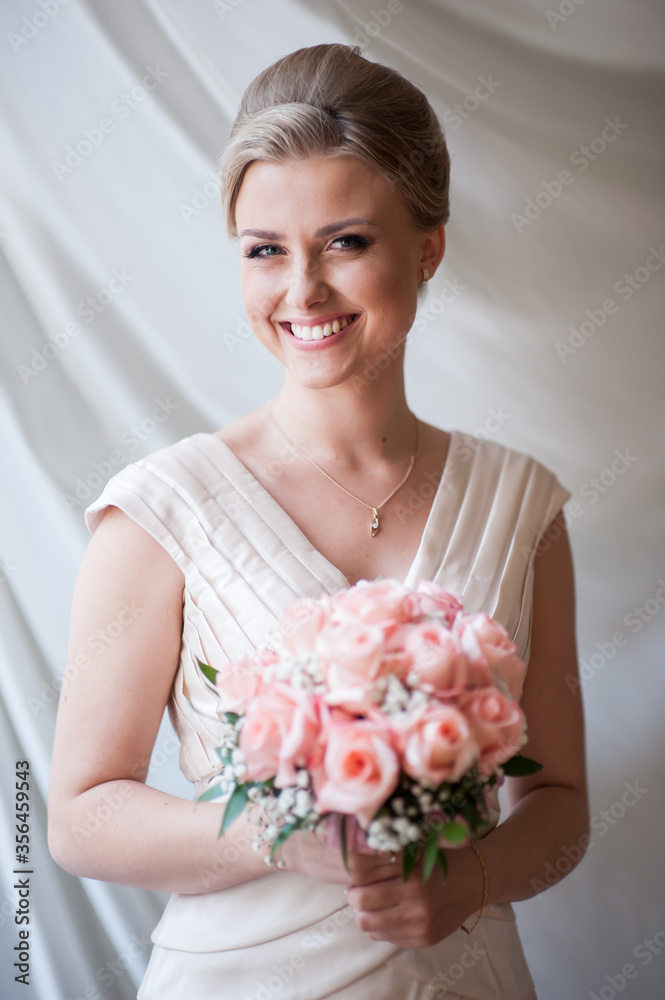 Beautiful happy blonde bride on her wedding day Beautiful happy blonde bride on her wedding day