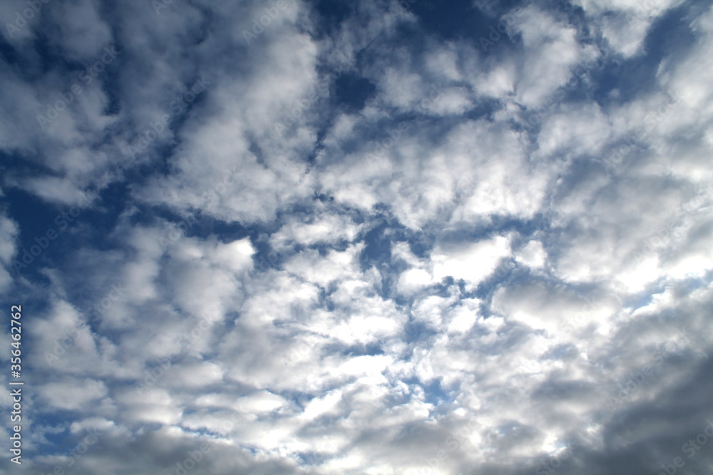 cloud pattern in the middle of a sunny sky cloud pattern in the middle of a sunny sky