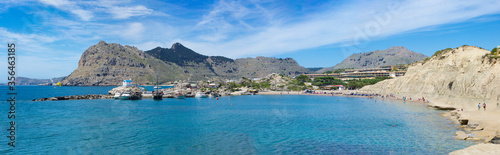 Beautiful panorama of the sea Bay with a beach line on the mountainous coast (Kolymbia, Rhodes, Greece)