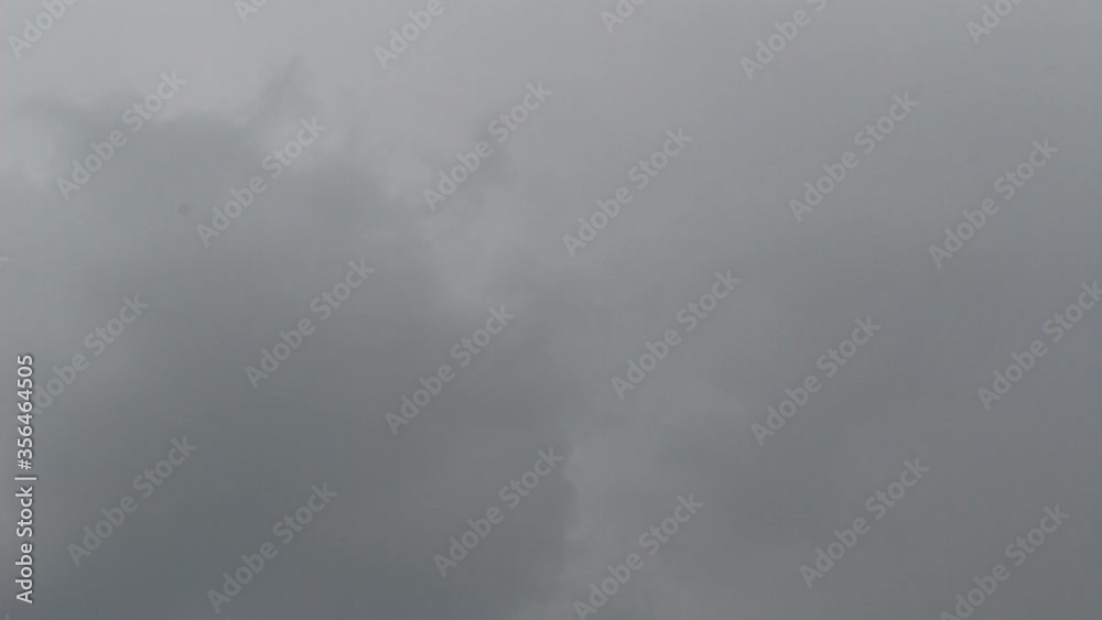 The motion of black clouds form above the sky before exceeding the rainy storm. The motion of black clouds form above the sky before exceeding the rainy storm.