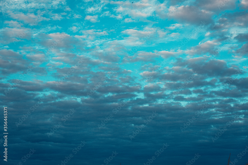 The texture of the blue sky with many clouds. The texture of the blue sky with many clouds.