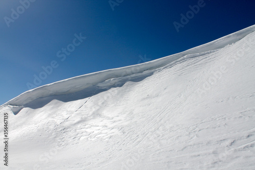 snow covered cliff
