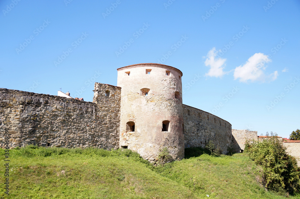 Fortress wall and watchtower without a roof in the old town in Slovakia