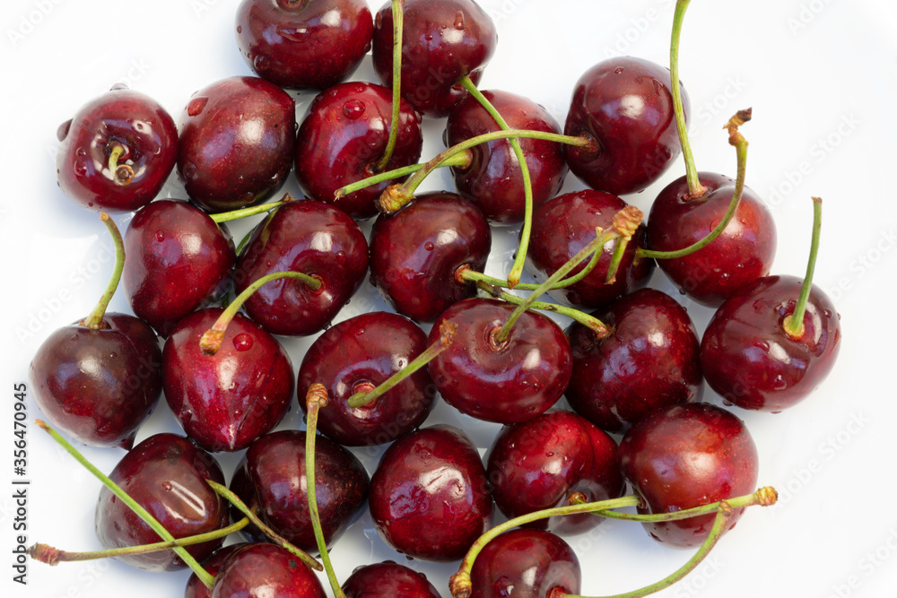 red cherries on white background red cherries on white background