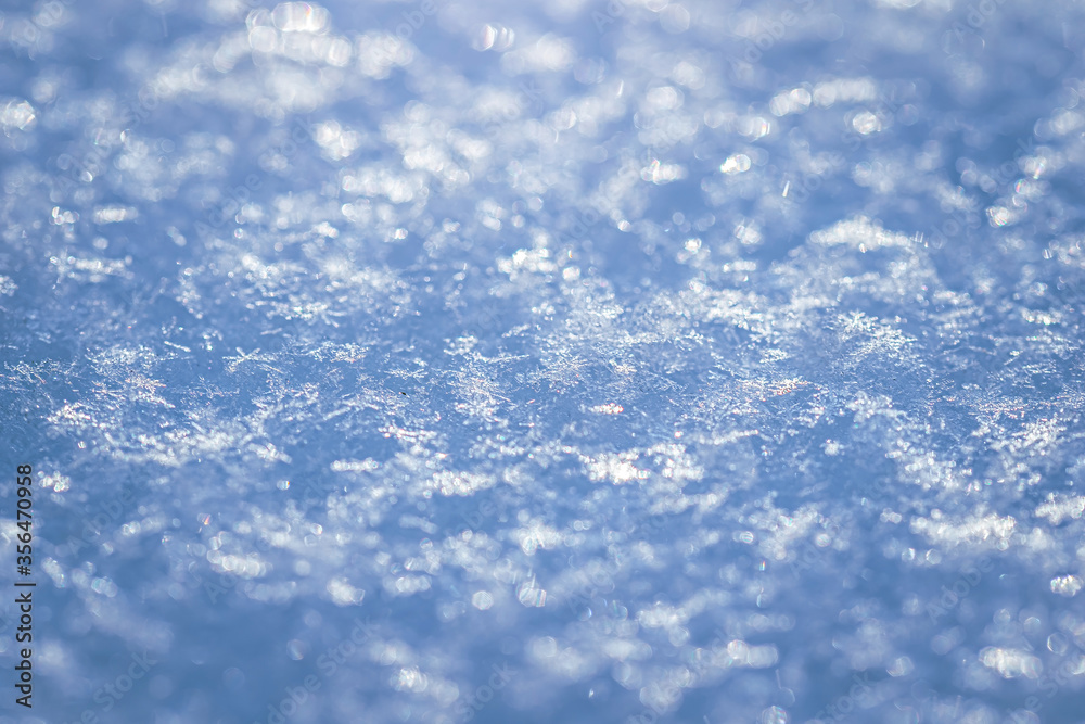 Obraz premium Macro background of fresh snowflake texture
