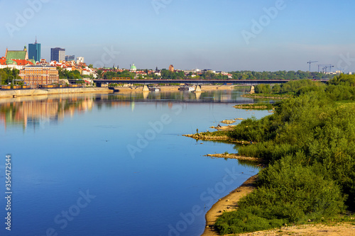 Panoramic view of Stare Miasto historic Old Town and northern districts along Vistula river with Most Slasko-Dabrowski bridge in Warsaw, Poland