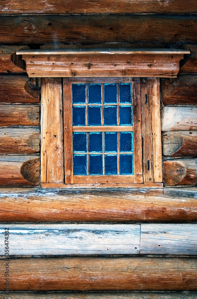 Old wooden window with wooden shutters Old wooden window with wooden shutters
