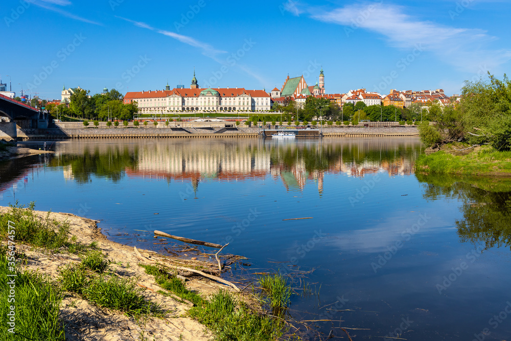 Panoramic view of Stare Miasto Old Town historic quarter with Wybrzerze Gdanskie embankment at Vistula river in Warsaw, Poland - obrazy, fototapety, plakaty 