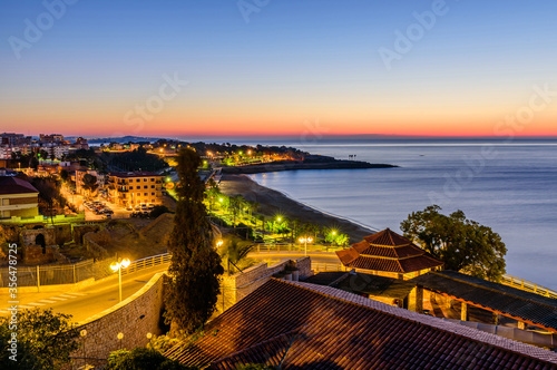 Cityscape of Tarragona. Beautiful night view of the Mediterranean coast and Tarragona town, Spain