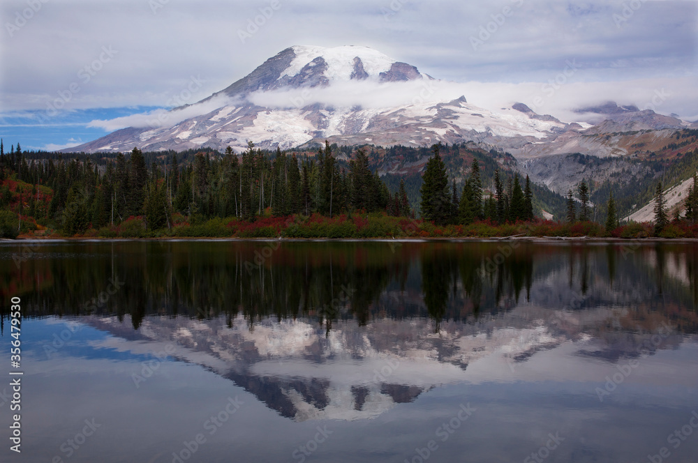 Bench Lake and Mt. Rainier with beautiful, calm reflections in autumn at Mt. Rainier National Park in Washington state
