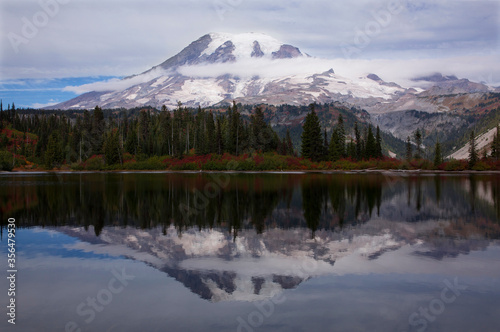 Bench Lake and Mt. Rainier with beautiful, calm reflections in autumn at Mt. Rainier National Park in Washington state 