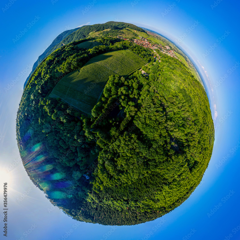 Fototapeta premium Abstract image of a small planet. Taken from the drone. Circular panorama.