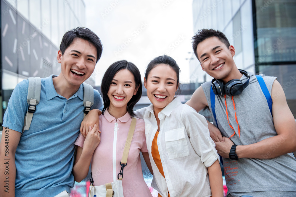 The portrait of happiness of college students play outdoors The portrait of happiness of college students play outdoors