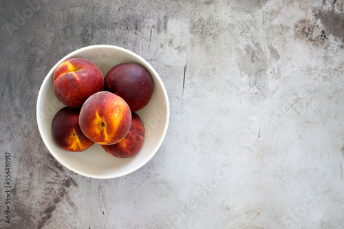 Bowl of Peaches with Room f...