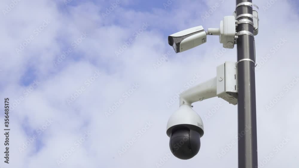 Security cameras on a pillar