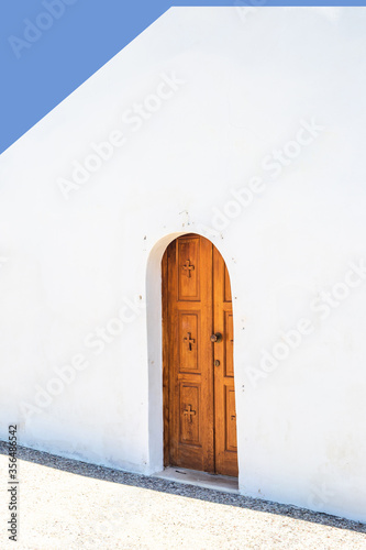 blue door in a white wall