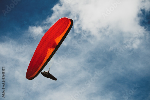 Paraglide in a blue sky