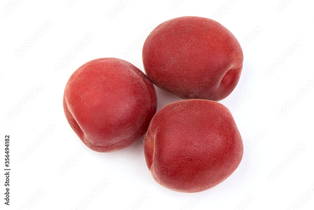 Sweet juicy red apricots, ripe nectarines, isolated on white background