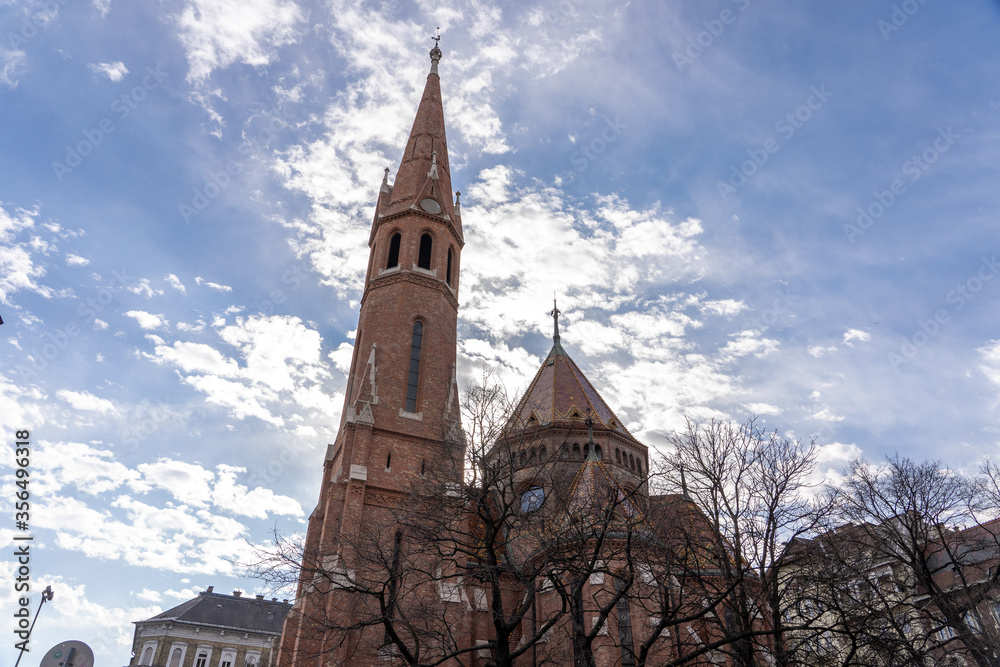 Upward view of Szilagyi Dezso Square Reformed Church by Danube river in Budapest