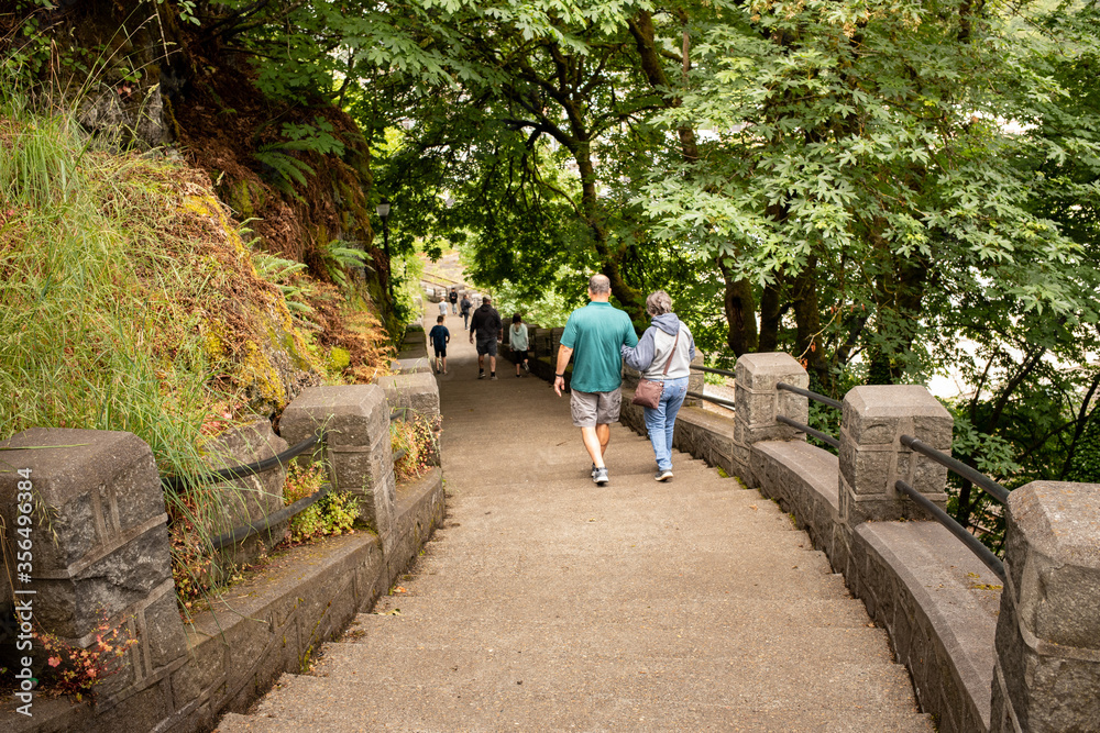 Fototapeta premium walking down stairs in park 