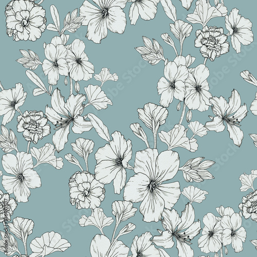 Floral seamless pattern with petunias and other flowers on blue background