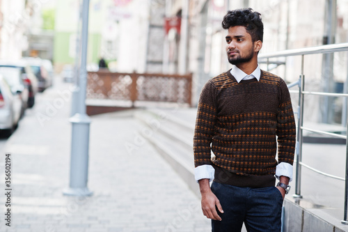Portrait of young stylish indian man model pose in street. © AS Photo Family