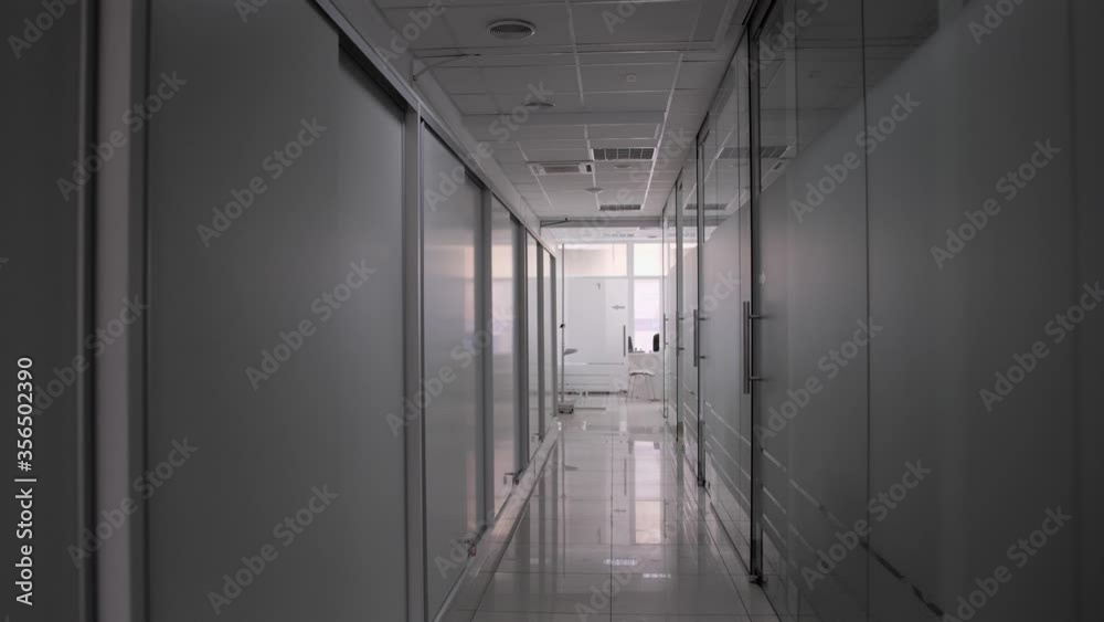 Corridor in a modern clinic.Be admitted to a hospital. Entering the hospital urgently on a stretcher. Corridor in a modern clinic.Be admitted to a hospital. Entering the hospital urgently on a stretcher.