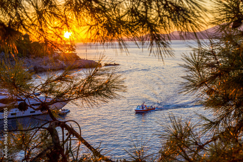 Sea taxi at entrance  for harbour to Greek island Spetses photo