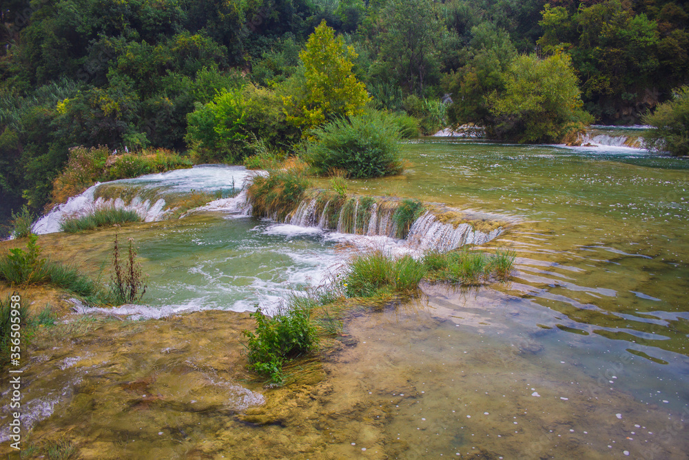 Obraz premium Krka National Park. Waterfall and wild landscape at famous tourist attraction in Croatia
