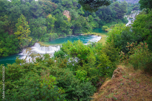 Krka National Park. Waterfall and wild landscape at famous tourist attraction in Croatia