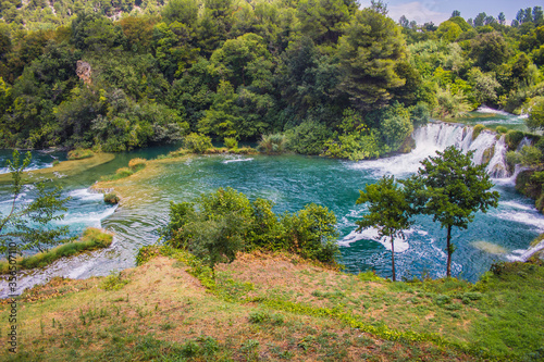 Krka National Park. Waterfall and wild landscape at famous tourist attraction in Croatia