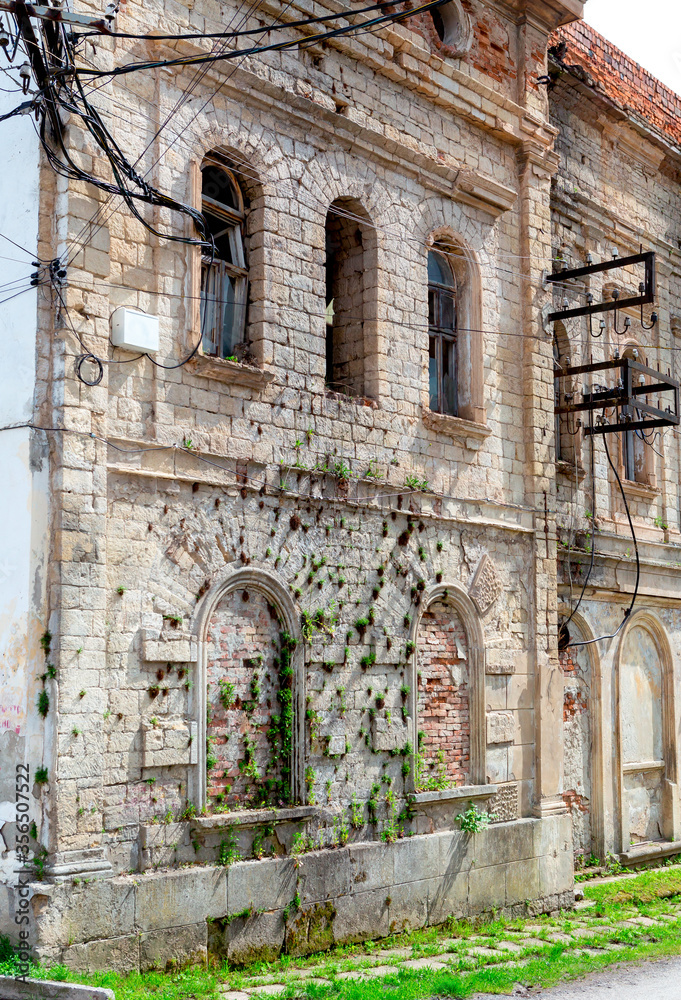 Old abandoned, dilapidated church, fragment of the synagogue building