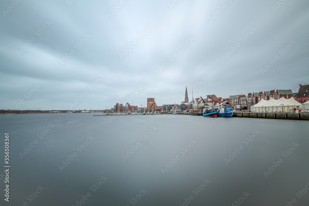 Long exposure in the harbour of Rostock, Germany on a cloudy day